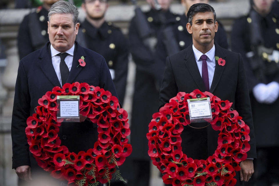 FILE - British Prime Minister Rishi Sunak, right, and Labour Party leader Keir Starmer attend the Remembrance Sunday ceremony at the Cenotaph on Whitehall in London, Nov. 13, 2022. In his first month as Britain's prime minister, Sunak has stabilized the economy, reassured allies from Washington to Kyiv and even soothed the European Union after years of sparring between Britain and the bloc. But Sunak’s challenges are just beginning. He is facing a stagnating economy, a cost-of-living crisis – and a Conservative Party that is fractious and increasingly unpopular after 12 years in power. (Toby Melville/Pool via AP, File)