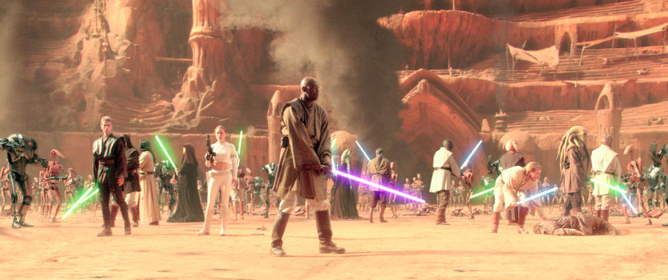 Mace holding his purple lightsaber