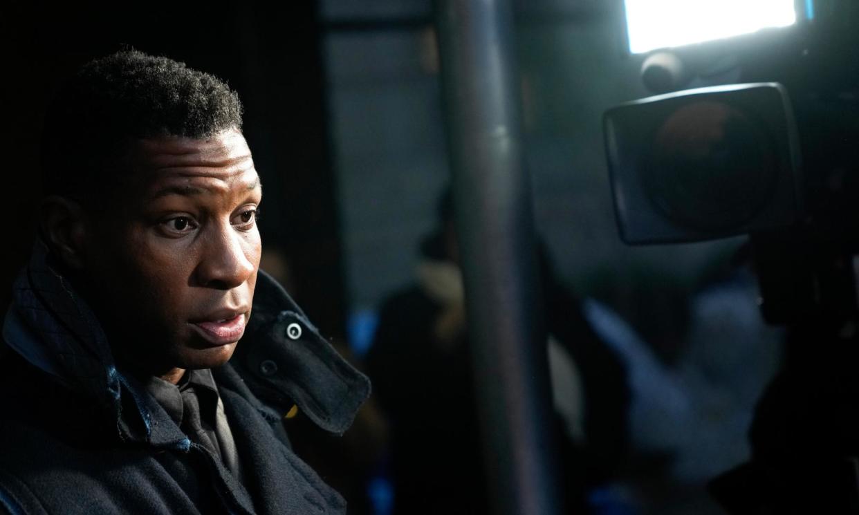 <span>Jonathan Majors leaves the Manhattan criminal courthouse in New York, on 18 December 2023.</span><span>Photograph: Seth Wenig/AP</span>