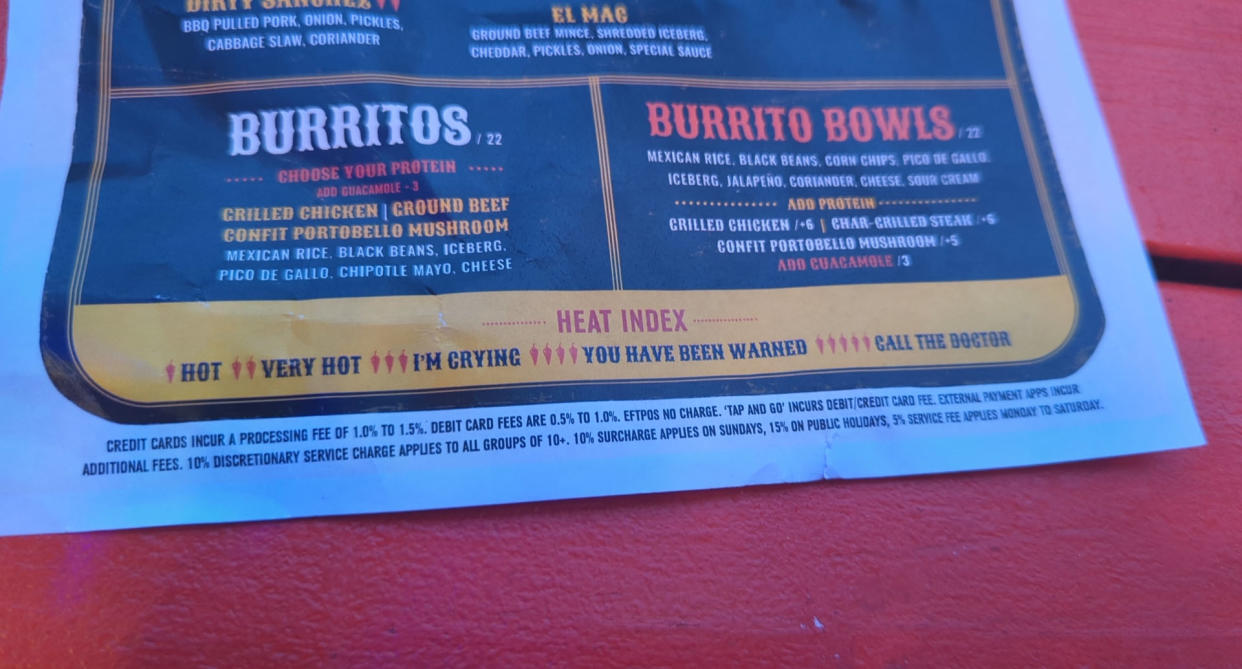 El Camino's restaurant menu which shows additional fees at the bottom.