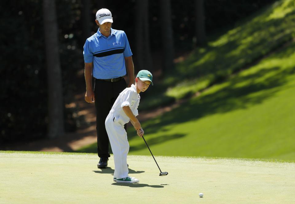 AUGUSTA, GEORGIA - APRIL 10: Charles Howell III of the United States watches son Chase putt during the Par 3 Contest prior to the Masters at Augusta National Golf Club on April 10, 2019 in Augusta, Georgia. (Photo by Kevin C. Cox/Getty Images)