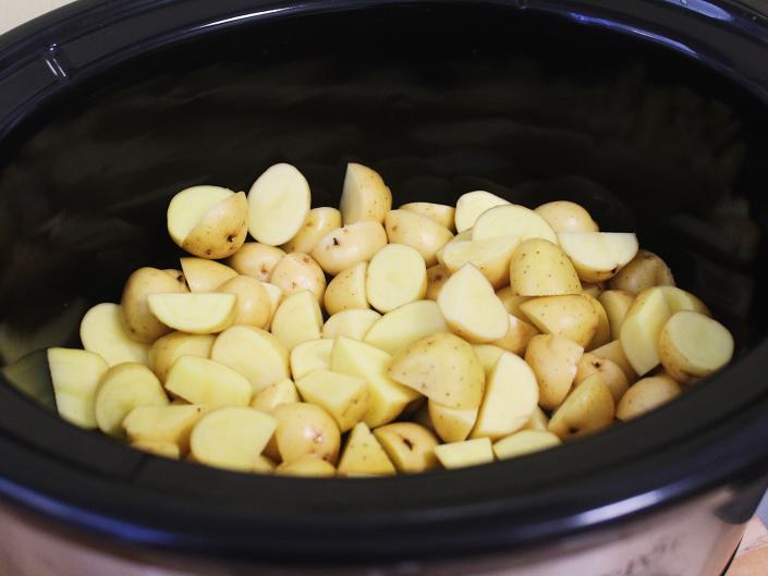 diced potatoes in a slow cooker