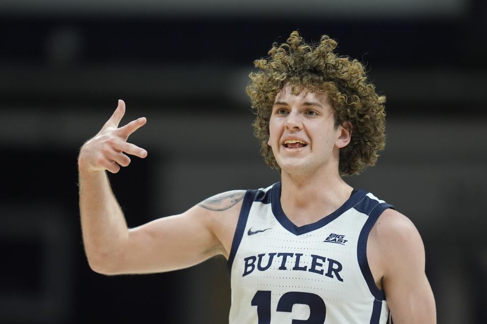 Butler's Finley Bizjack reacts after hitting a 3-point shot against Marquette during the second half of an NCAA college basketball game Tuesday, Feb. 13, 2024, in Indianapolis. (AP Photo/Darron Cummings)