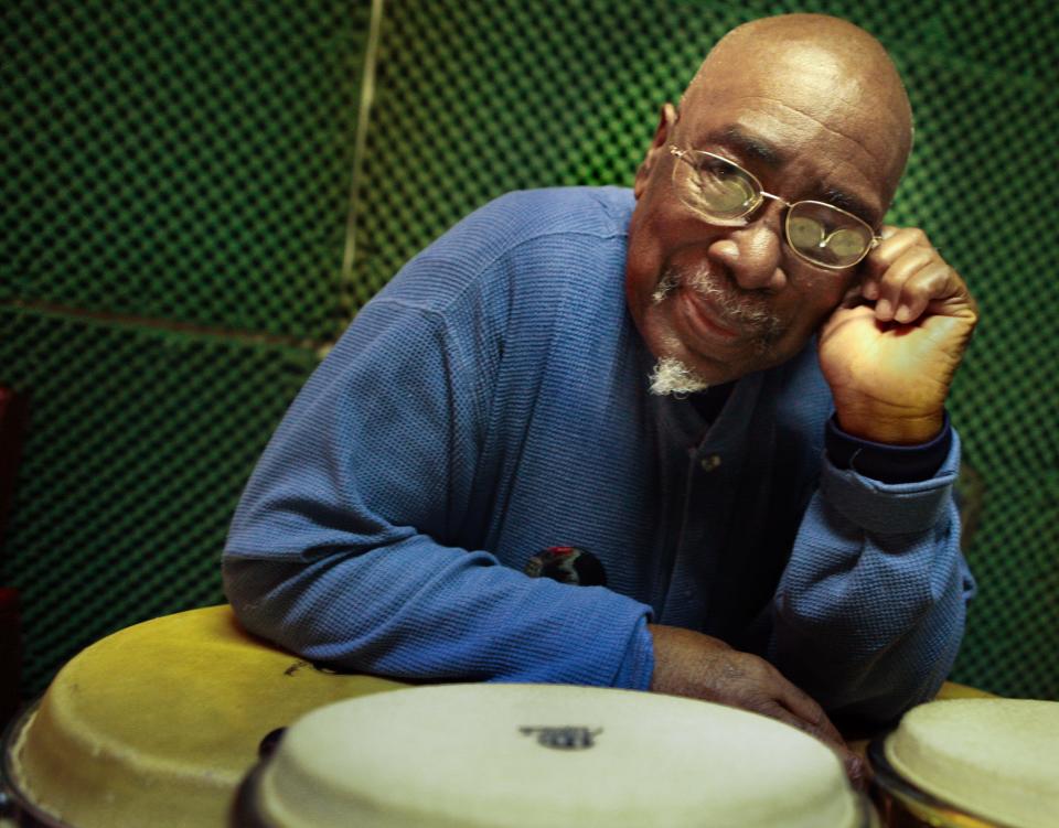 Bill Curtis, a percussionist with The Fat Back Band, rests on his congas between songs during practice with his band in a rehearsal space on Donaldson Street on Jan. 30, 2013.