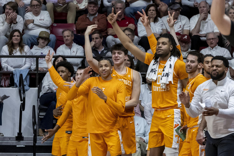 Tennessee's bench cheers for a score during the first half of an NCAA college basketball game against Alabama, Saturday, March 2, 2024, in Tuscaloosa, Ala. (AP Photo/Vasha Hunt)