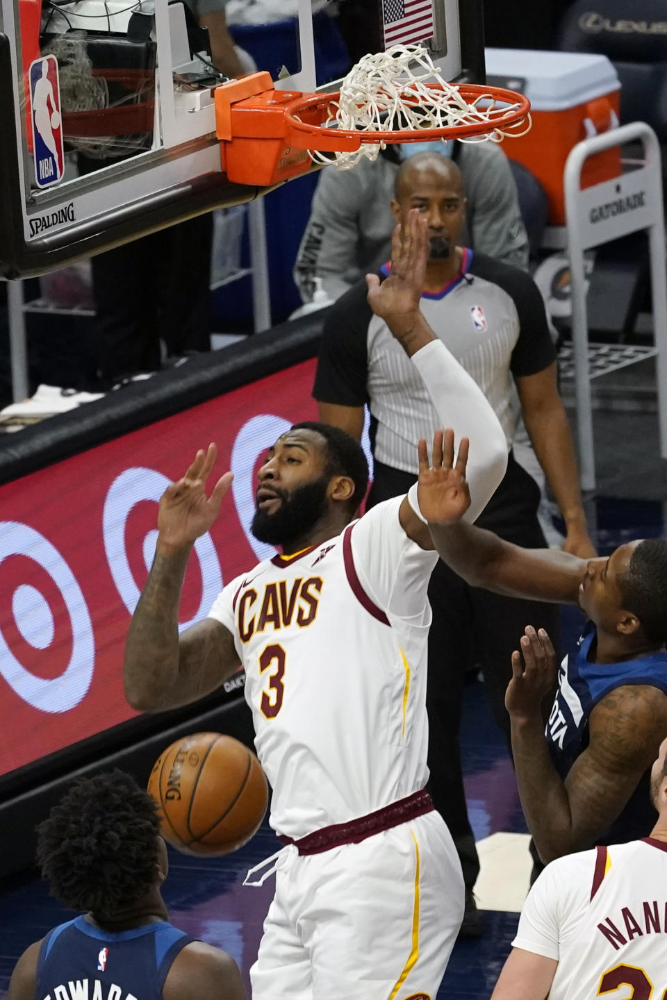 Cleveland Cavaliers' Andre Drummond (3) dunks against the Minnesota Timberwolves in the first half of an NBA basketball game Sunday, Jan. 31, 2021, in Minneapolis. (AP Photo/Jim Mone)