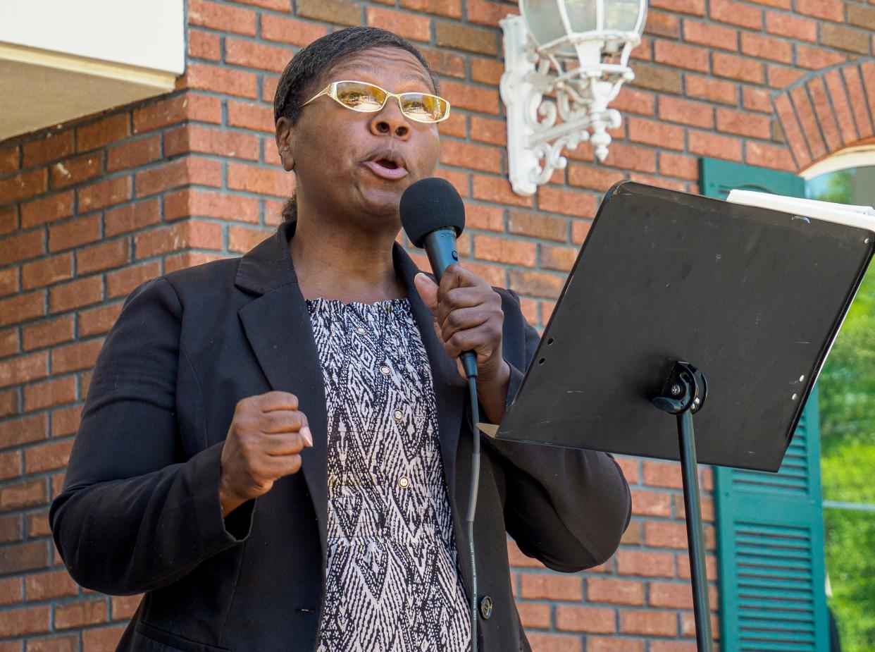 Katima Stephens speaks during an interfaith prayer vigil held in the aftermath of recent mass shootings in Wildwood on Saturday, May 28, 2022. [PAUL RYAN / CORRESPONDENT]