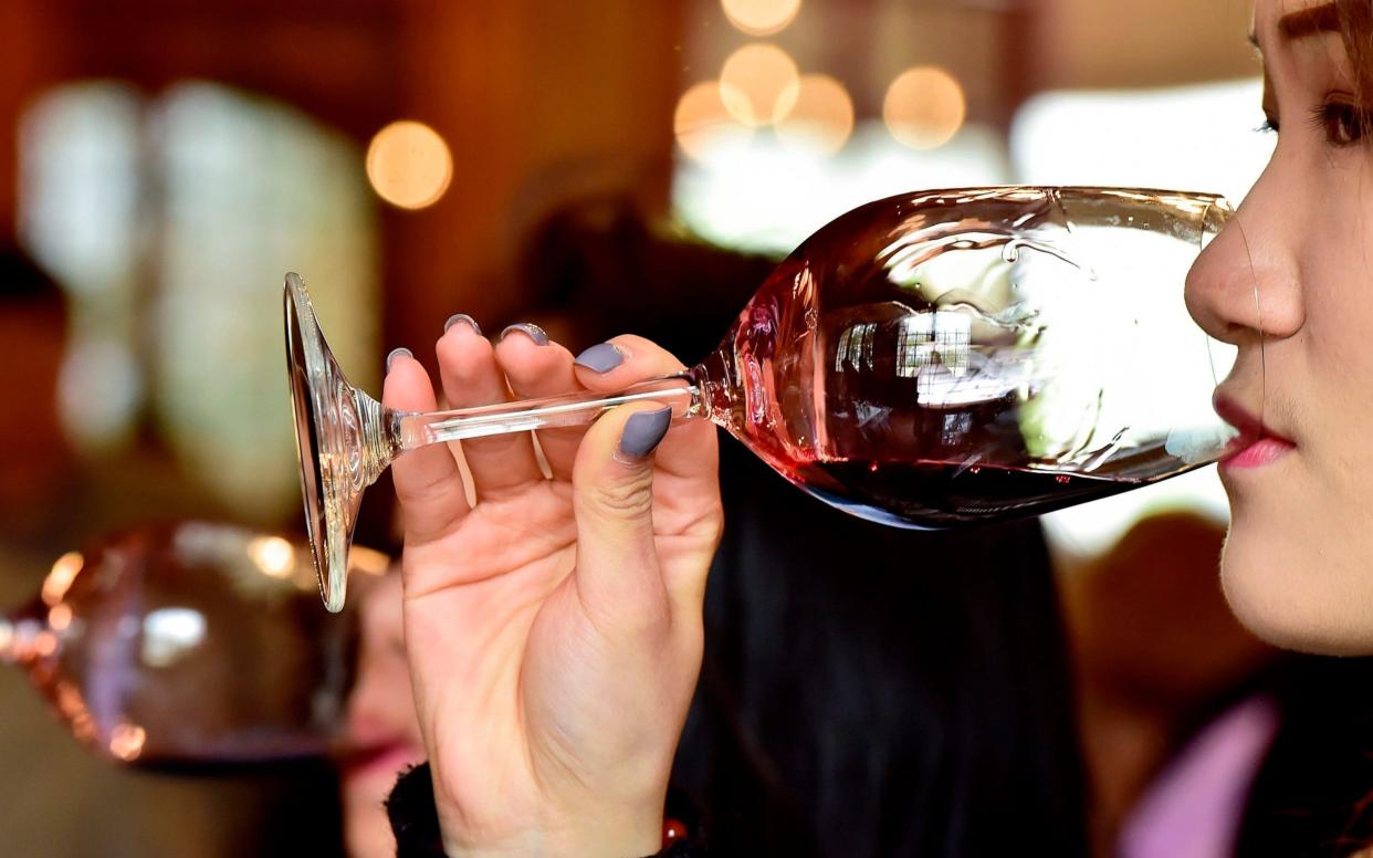 Red wine has fallen out of favour with younger consumers - AFP