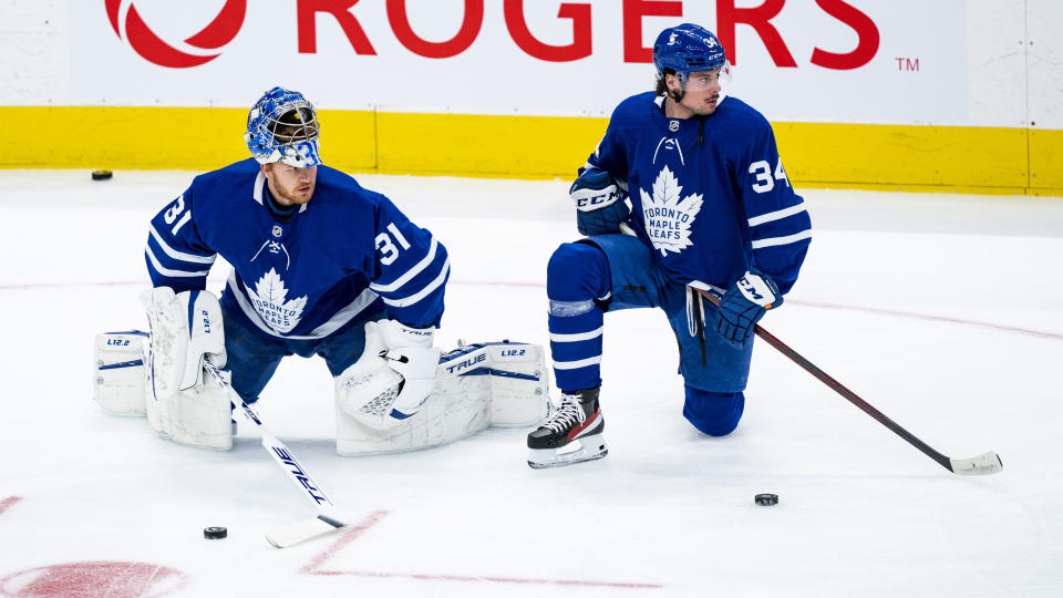 TORONTO, ON - FEBRUARY 8: Frederik Andersen #31 and Auston Matthews #34 of the Toronto Maple Leafs warm up before facing the Vancouver Canucks at the Scotiabank Arena on February 8, 2021 in Toronto, Ontario, Canada. (Photo by Kevin Sousa/NHLI via Getty Images)