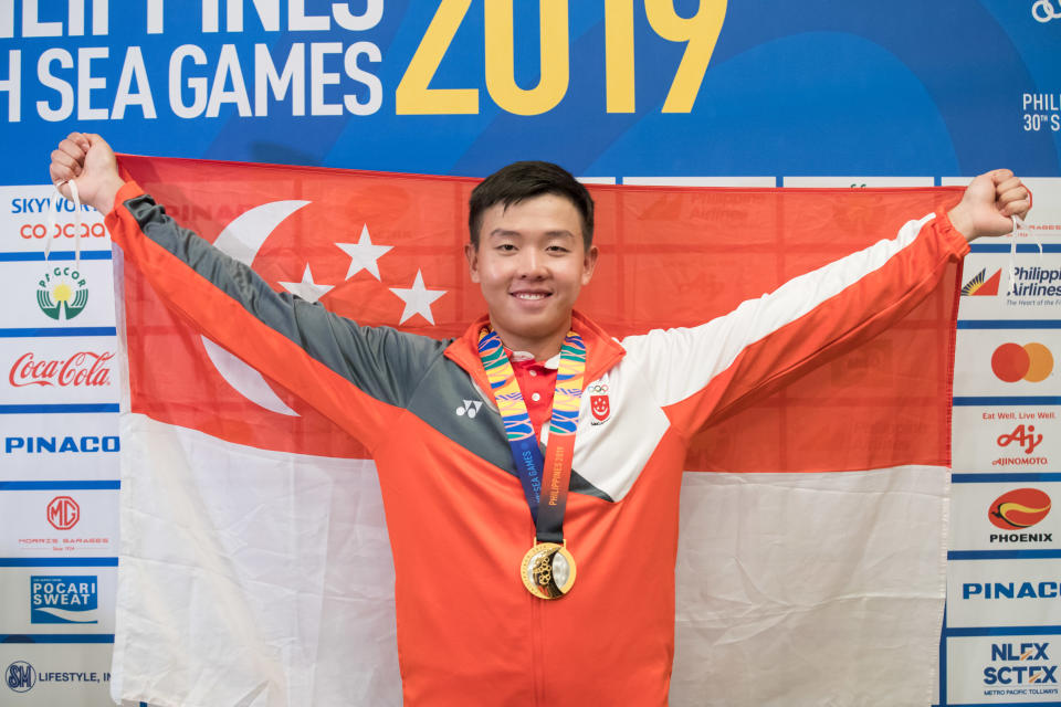 Singapore sailor Ryan Lo wins gold in the men's laser standard at the SEA Games. (PHOTO: Sport Singapore / Dyan Tjhia)