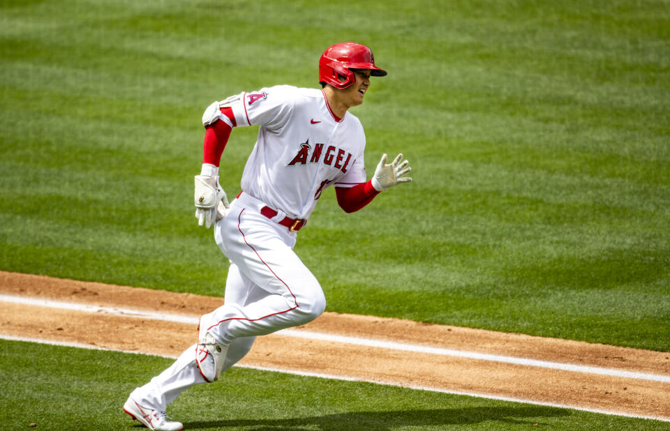 ANAHEIM, CA - APRIL 21, 2021:  Los Angeles Angels designated hitter Shohei Ohtani (17) runs the bases after hitting a solo homer against Texas Rangers starting pitcher Mike Foltynewicz (20) in the 3rd inning  at Angel Stadium on April 21, 2021 in Santa Ana California.(Gina Ferazzi / Los Angeles Times via Getty Images)