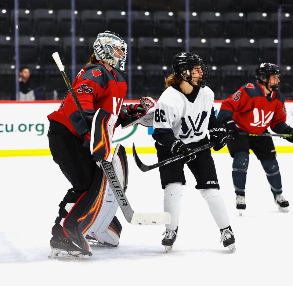 PWHL Ottawa goaltender Sandra Abstreiter plays in a pre-season game against Minnesota. She will be one of three goalies on the team's roster this season.