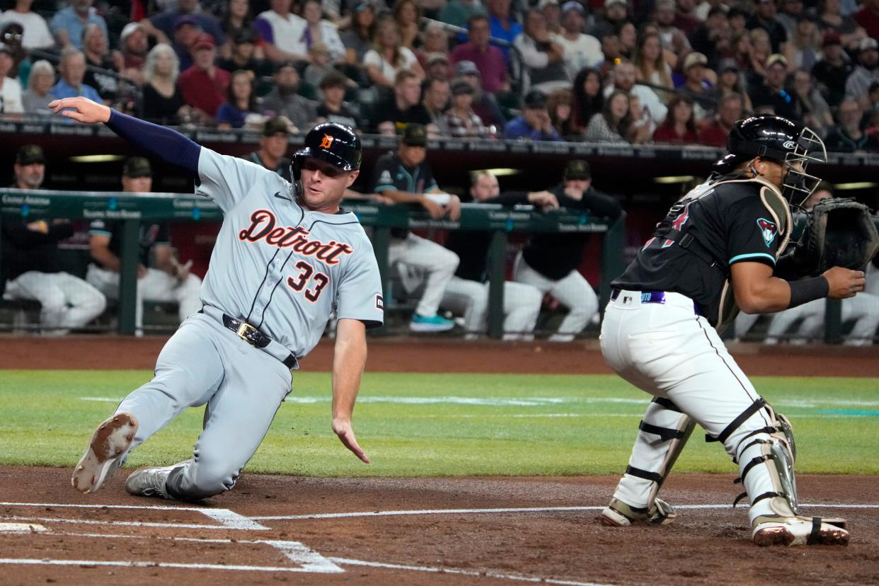 Detroit Tigers second baseman Colt Keith (33) scores a run against the Arizona Diamondbacks in the second inning at Chase Field in Phoenix on Friday, May 17, 2024.