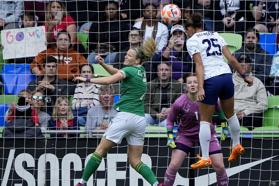 Ireland goalkeeper Courtney Brogan (1) and defender Diane Caldwell (7) defend the goal as United States forward Trinity Rodman (25) tries to score with a header during the second half of an international friendly soccer match in Austin, Texas, Saturday, April 8, 2023. (AP Photo/Eric Gay)