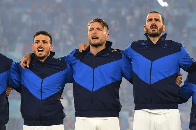 ROME, ITALY - JUNE 11: (L - R) Alessandro Florenzi, Ciro Immobile and Leonardo Bonucci of Italy line up to sing the national anthem prior to the UEFA Euro 2020 Championship Group A match between Turkey and Italy at the Stadio Olimpico on June 11, 2021 in Rome, Italy. (Photo by Claudio Villa/Getty Images) (Photo: Claudio Villa via Getty Images)