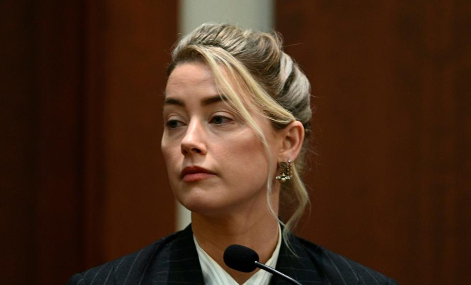 Actor Amber Heard testifies in the courtroom at the Fairfax County Circuit Courthouse in Fairfax, Va., on May 17, 2022.