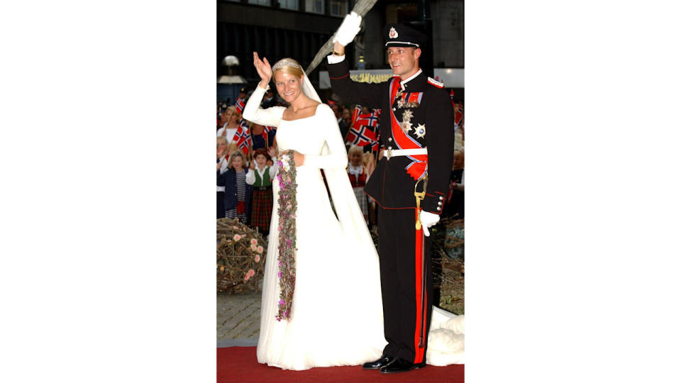 Crown Prince Haakon Of Norway & Mette-Marit waving