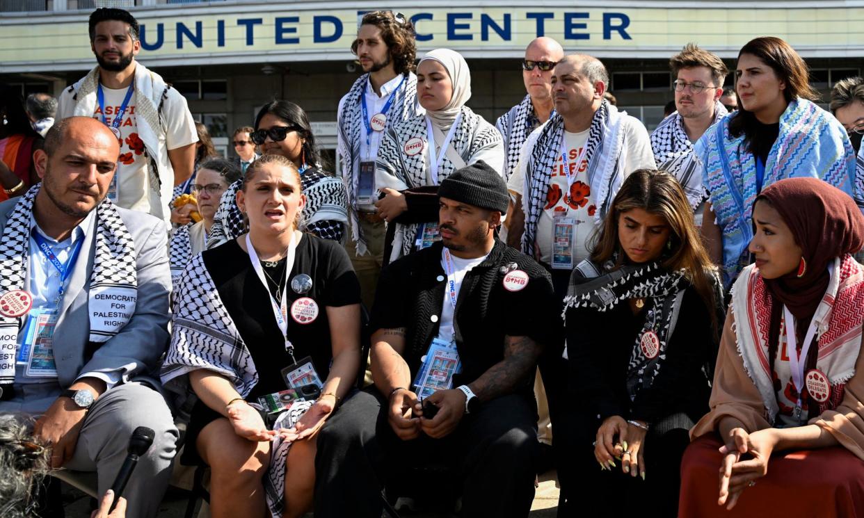 <span>Pro-Palestinian uncommitted delegates speak to the press during a demonstration in Chicago, Illinois, on Thursday.</span><span>Photograph: Vincent Alban/Reuters</span>