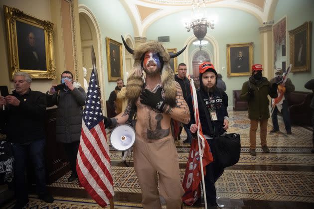 A pro-Trump mob confronts U.S. Capitol police outside the Senate chamber of the U.S. Capitol Building on Jan. 6 in Washington, D.C. (Photo: Win McNamee via Getty Images)