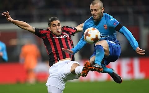 Jack Wilshere in action against AC Milan in the Europa League - Credit: GETTY IMAGES