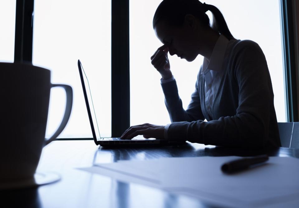 Stressed businesswoman in the office