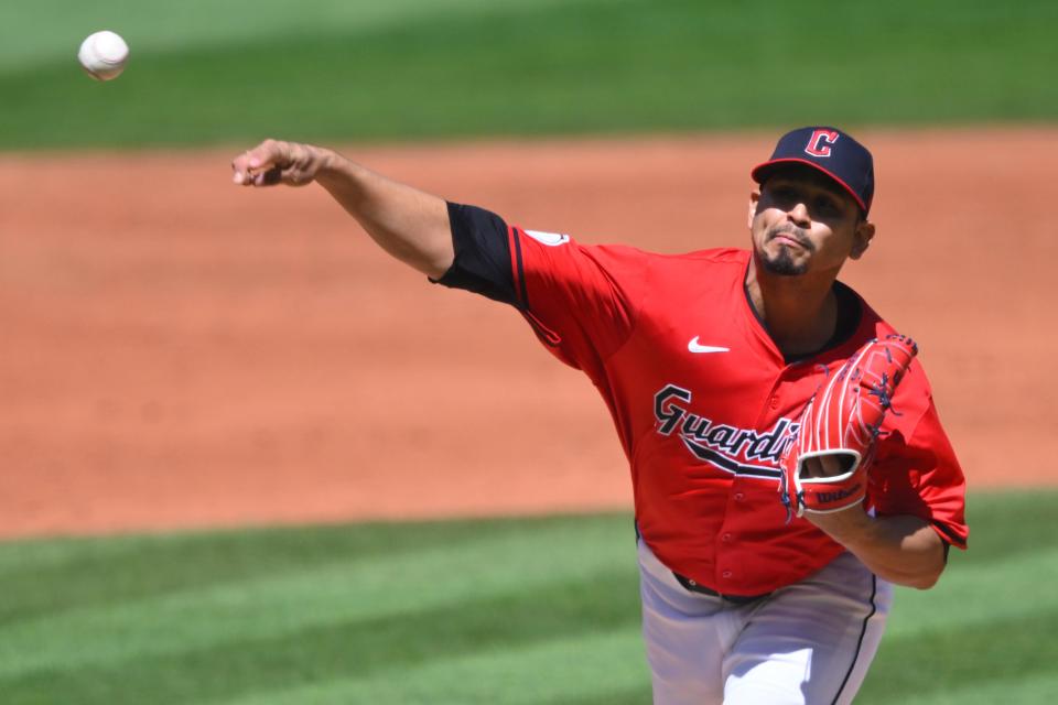 Cleveland Guardians pitcher Carlos Carrasco (59) delivers a pitch in the third inning against the New York Yankees on Saturday in Cleveland.