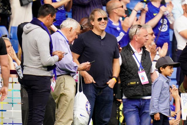 Todd Boehly, centre, watched Chelsea beat Watford on Sunday