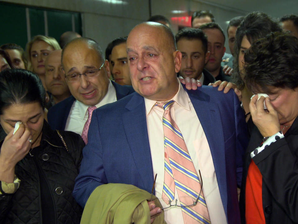 On Nov. 2, 2018, Pat Comunale, center, surrounded by family and friends, talks to reporters after James Rackover was convicted on all counts for the murder of his son Joey. / Credit: WCBS