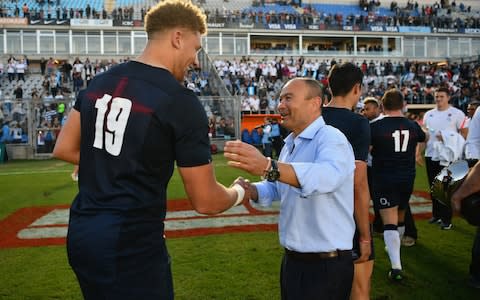 Nick Isiekwe with Eddie Jones - Credit: GETTY IMAGES