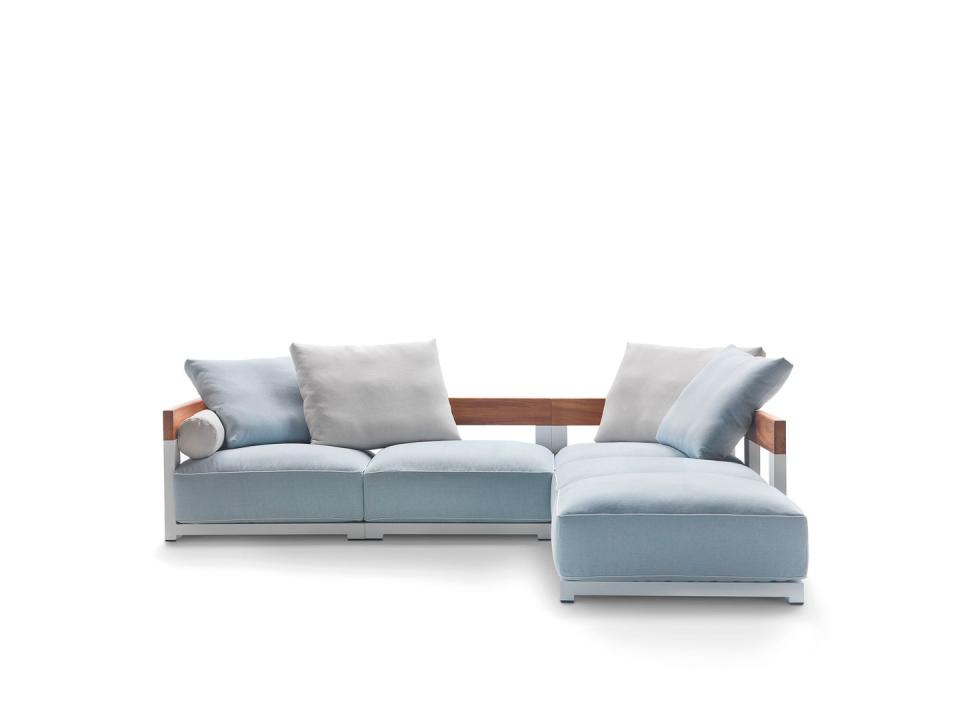 sectional sofa in light blue with back cutouts