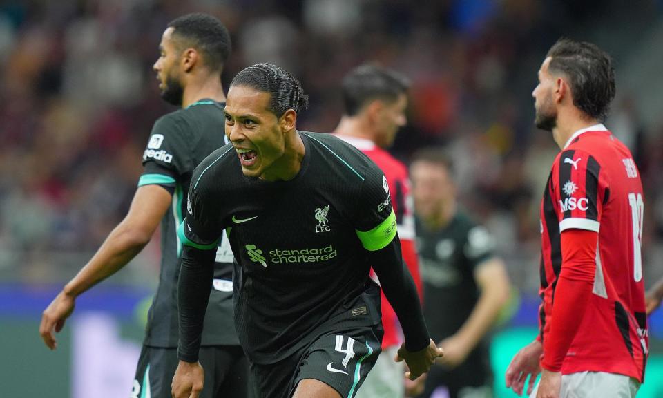 <span>Virgil van Dijk celebrates after heading Liverpool 2-1 in front at San Siro.</span><span>Photograph: Spada/LaPresse/Shutterstock</span>