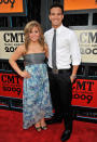 Olympic gymnast Shawn Johnson and dancing partner Mark Ballas attend the 2009 CMT Music Awards at the Sommet Center on June 16, 2009 in Nashville, Tennessee.