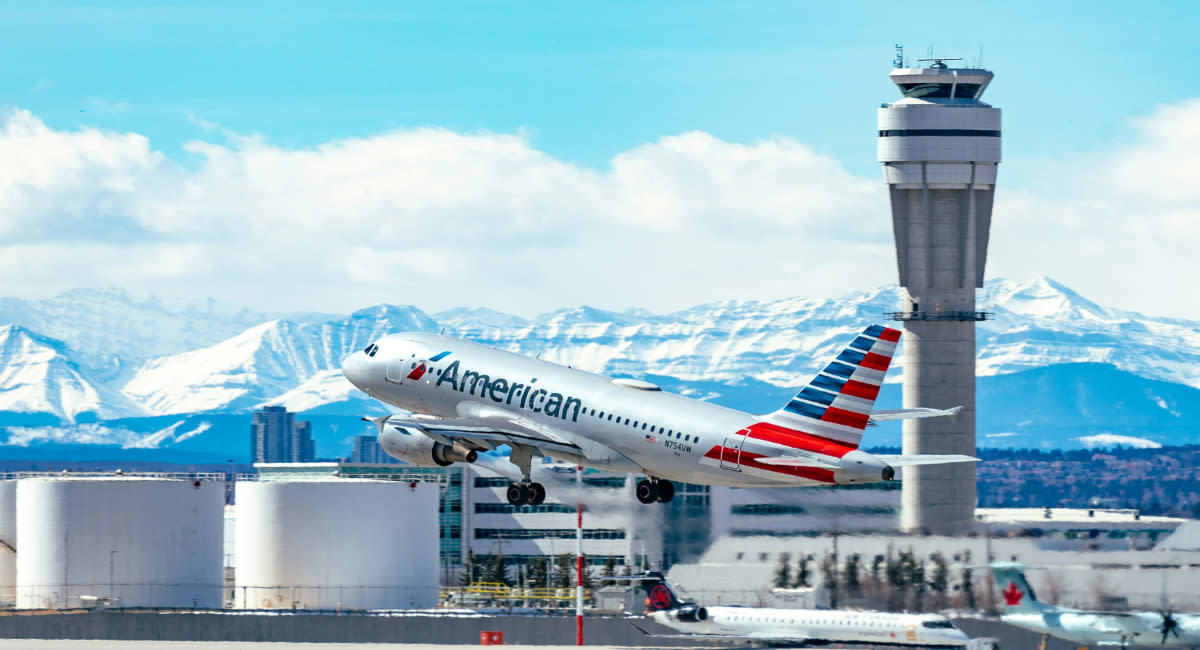 American Airlines A319 blasting off on a gorgeous spring day.