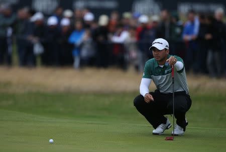 Golf - British Open - Jason Day of Australia lines up a putt on the first hole during the third round - Royal Troon, Scotland, Britain - 16/07/2016. REUTERS/Russell Cheyne