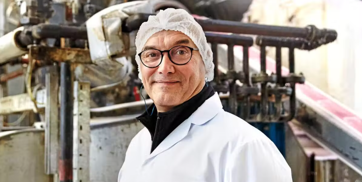 gregg wallace on inside the factory, in a hair net and white coat