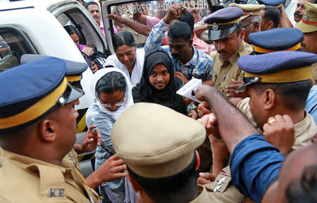 Akhila, 24, who converted to Islam in 2016 and took a new name, Hadiya, arrives at the airport in Kochi, November 25, 2017. REUTERS/Sivaram V