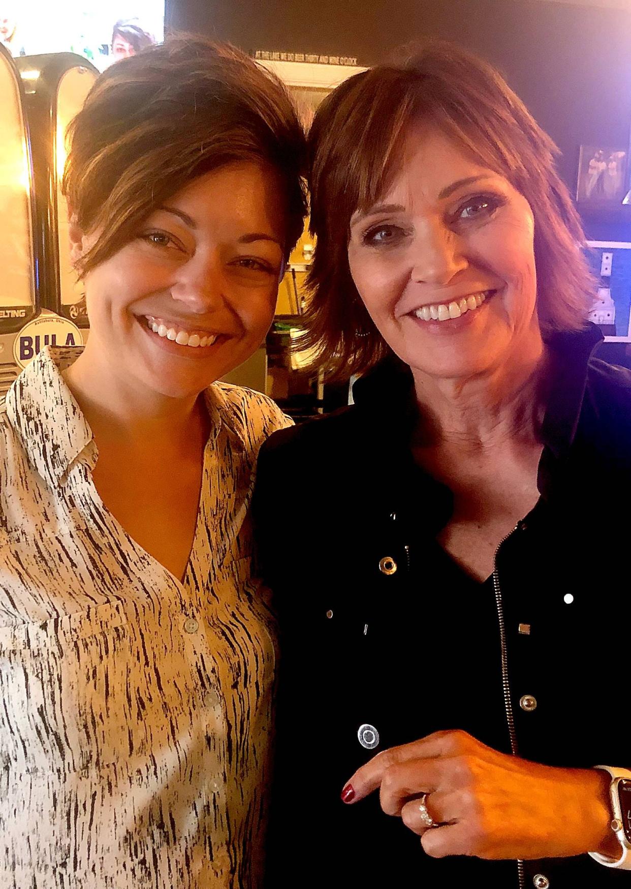 Taylor Hill, left, and her mother, Karen Wheeler, are fixing up the former Pizzi Cafe in Conneaut, Ohio, which was opened by Wheeler's grandfather in 1934.