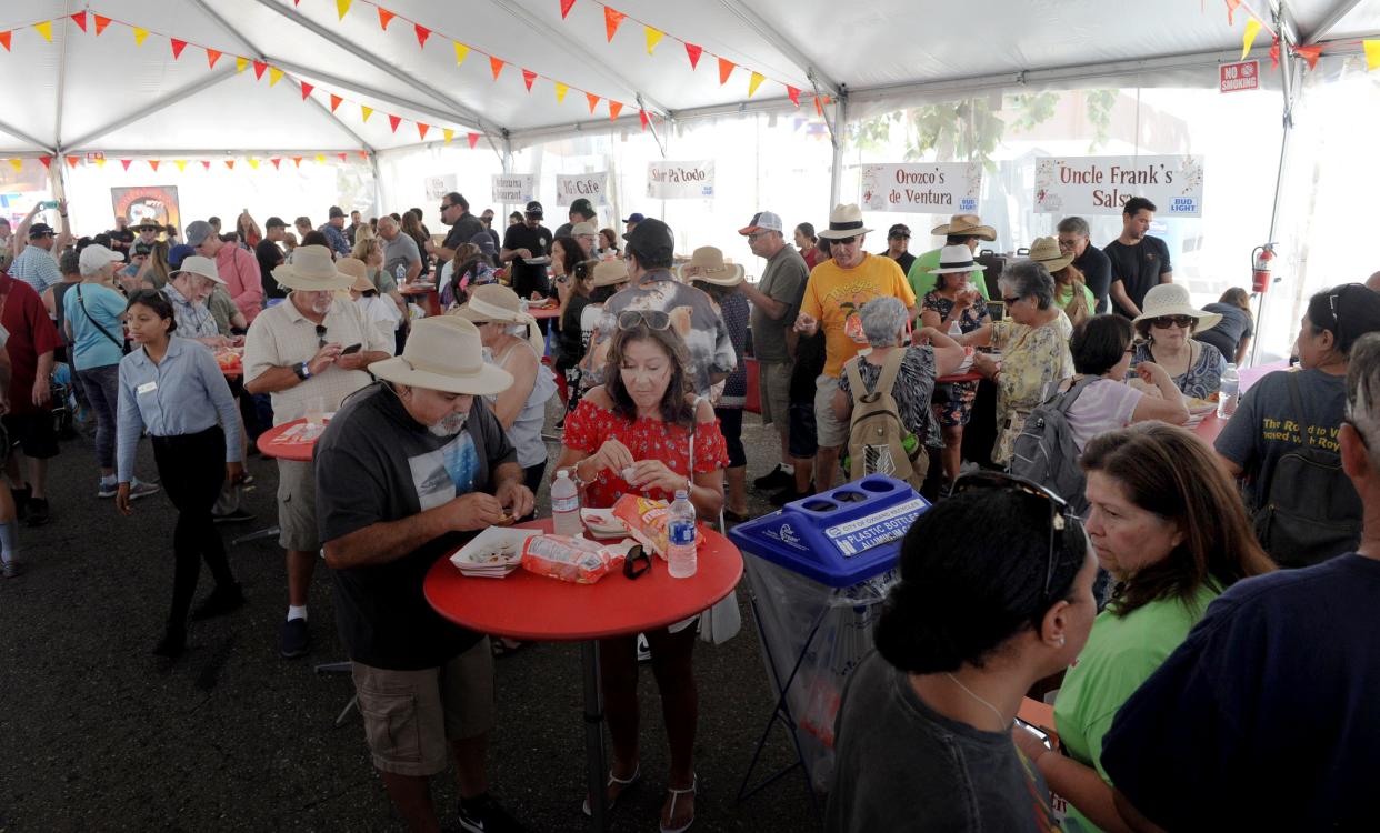 Salsa fans enjoy the tasting tent at the Oxnard Salsa Festival in 2019. The festival will return to Oxnard's Plaza Park on July 27-28.