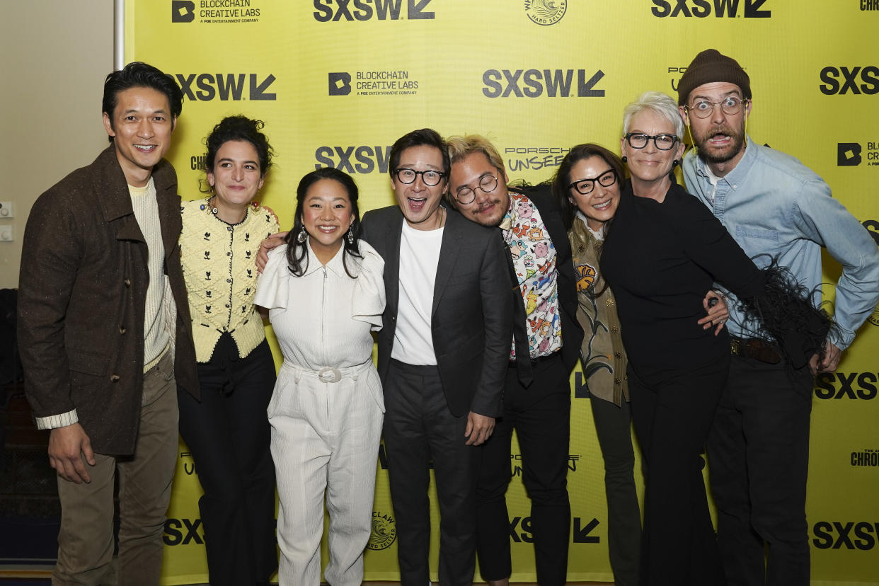 AUSTIN, TEXAS - MARCH 11: (L-R) Harry Shum Jr., Jenny Slate, Stephanie Hsu, Ke Huy Quan, Daniel Kwan, Michelle Yeoh, Jamie Lee Curtis and Daniel Scheinert attend SXSW Film Festival Opening Party during the 2022 SXSW Conference and Festivals at The Driskill Hotel on March 11, 2022 in Austin, Texas. (Photo by Amy E. Price/Getty Images for SXSW)