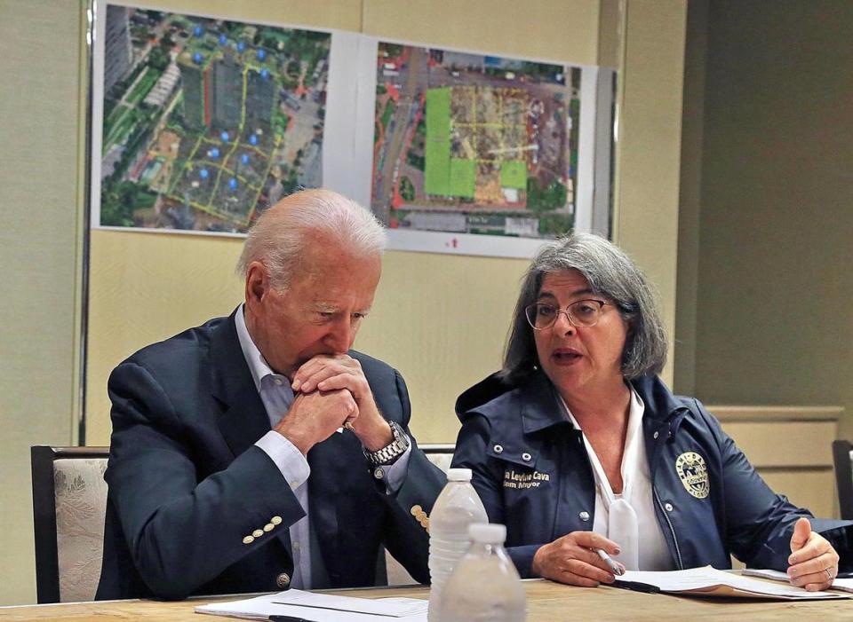 Miami-Dade County Mayor Daniella Levine Cava confers with President Joe Biden during a meeting with officials at the St. Regis Resort in Bal Harbour on Thursday, July 1, 2021.