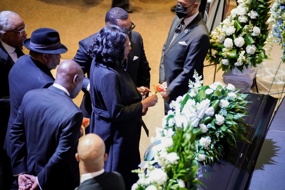 RowVaughn Wells pauses at the casket of her son, Tyre Nichols, 29, at his funeral service in Memphis, Tenn., on Feb. 1, 2023.