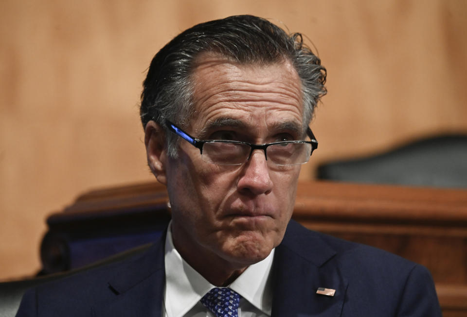 Sen. Mitt Romney, R-Utah, listens as Colonial Pipeline CEO Joseph Blount testifies during a Senate Homeland Security and Government Affairs Committee hearing one day after the Justice Department revealed it had recovered the majority of the $4.4 million ransom payment the company made in hopes of getting its system back online, Tuesday, June 8, 2021, on Capitol Hill, in Washington. (Andrew Caballero-Reynolds/Pool via AP)