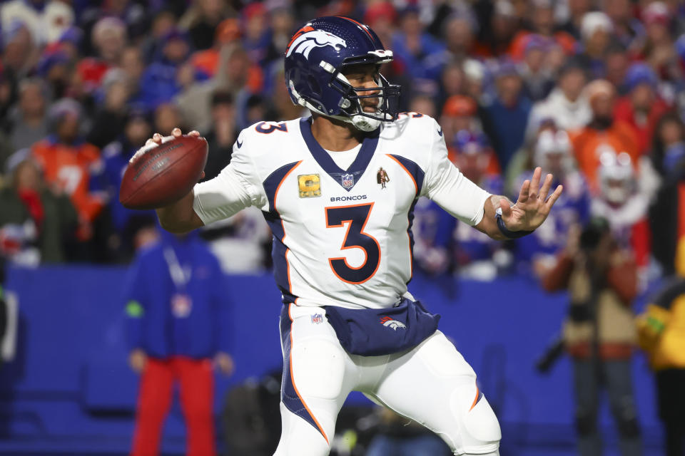 Denver Broncos quarterback Russell Wilson looks to throw during the first half of an NFL football game against the Buffalo Bills, Monday, Nov. 13, 2023, in Orchard Park, N.Y. (AP Photo/Jeffrey T. Barnes)