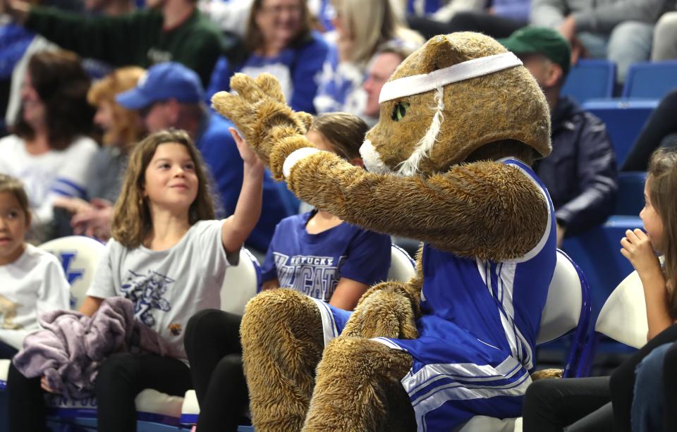 The Kentucky Wildcat high fived with a girl against Texas A&M-Commerce.