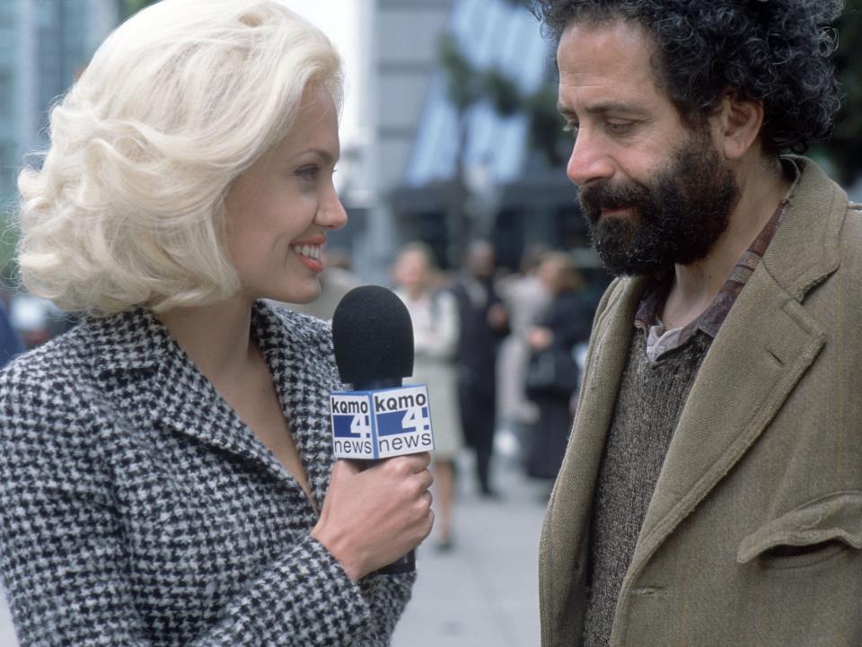 Angelina Jolie and Tony Shalhoub in ‘Life or Something Like It’ (2002)Diyah Pera/New Regency/Aei/Kobal/Shutterstock