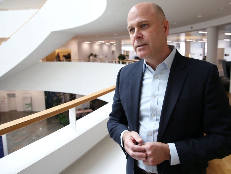 Novo Nordisk’s Executive Vice President, Corporate Development, David Moore talks to a journalist in Copenhagen