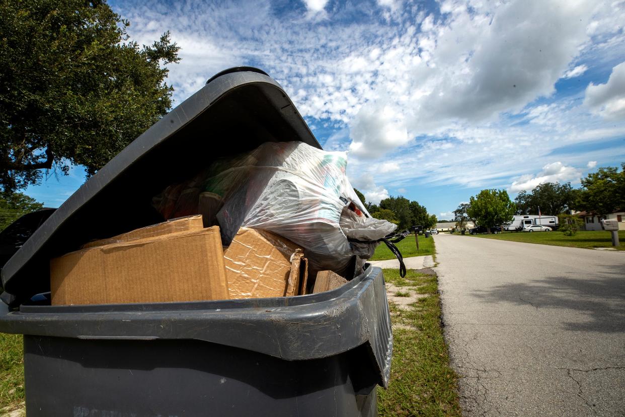 Garbage cans along Hurst Road in Auburndale.