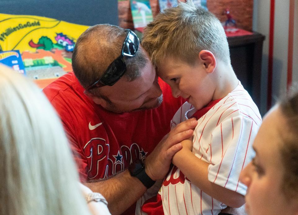 Gary Linder, left, talks to his son Rowan Linder, a 5 year-old big-time baseball fan who is battling cancer, after seeing his newly decorated Phillies-themed bedroom in Middletown on Thursday, Sept. 7, 2023.

[Daniella Heminghaus | Bucks County Courier Times]