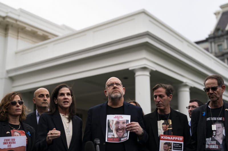 The families of Americans who were taken hostage by Hamas during its attack on Israel Oct. 7 speak to the press after meeting President Joe Biden at the White House in Washington, D.C/, on Wednesday. Photo by Al Drago/UPI