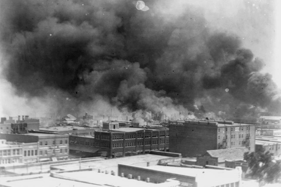 <p>Alvin C. Krupnick Co./Library of Congress via AP</p> In this 1921 image provided by the Library of Congress, smoke billows over Tulsa, Okla.